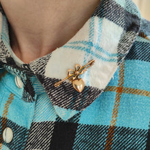 Load image into Gallery viewer, Antique 9ct Gold Heart and Bow Bar Brooch modelled on the collar of a blue and white gingham pattern shirt