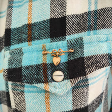 Load image into Gallery viewer, Antique 9ct Gold Heart and Bow Bar Brooch modelled on the pocket of a blue and white gingham pattern shirt