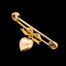 Load image into Gallery viewer, Antique 9ct Gold Heart and Bow Bar Brooch viewed from the back, on a black background