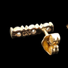 Load image into Gallery viewer, A yellow gold three stone diamond bar set stud earring, stamped DIA 020, on a black background