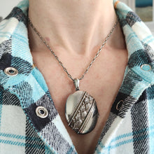 Load image into Gallery viewer, An oval silver locket pendant with acorn and oak leaf, modelled with a silver chain