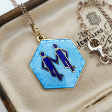 Load image into Gallery viewer, A hexagonal Gemini star sign pendant in blue enamel, with a chain, in an antique jewellery box