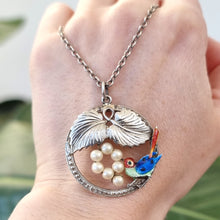 Load image into Gallery viewer, Vintage Sterling Silver Enamel Bird Necklace by Ward Brothers in hand