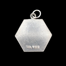 Load image into Gallery viewer, Hexagonal silver pendant with 'SILVER' engraving on a black background