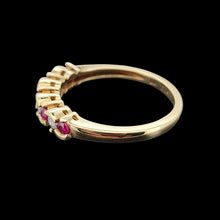 Load image into Gallery viewer, Vintage 9ct Yellow Gold Ruby and Diamond Scalloped Edge Ring viewed from the side, on a black background