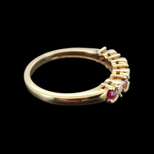 Load image into Gallery viewer, Vintage 9ct Yellow Gold Ruby and Diamond Scalloped Edge Ring viewed from the side, on a black background