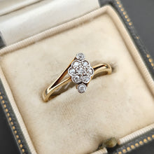 Load image into Gallery viewer, A diamond cluster crossover ring in 18 carat yellow gold and platinum, in an antique ring box