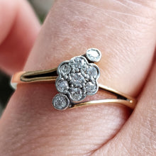 Load image into Gallery viewer, A diamond cluster crossover ring in 18 carat yellow gold and platinum, modelled on a hand