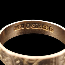 Load image into Gallery viewer, Close-up of a gold ring with a Brimingham assay 1894 hallmark on a black background 
