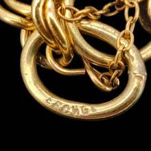 Load image into Gallery viewer, Close-up of a yellow gold link stamped EFCHGP
