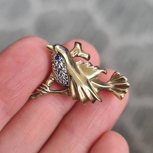 Vintage 9ct Gold Diamond & Sapphire Bird Brooch in hand