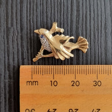 Load image into Gallery viewer, Vintage 9ct Gold Diamond &amp; Sapphire Bird Brooch next to ruler
