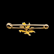 Load image into Gallery viewer, A yellow gold floral bar brooch, on a black background
