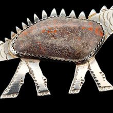 Load image into Gallery viewer, A silver long-necked dinosaur brooch with a hardstone body
