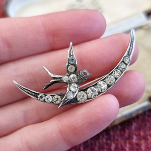 Victorian Sterling Silver & Paste Swallow and Crescent Moon Brooch in hand