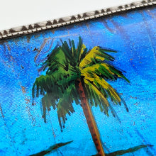 Load image into Gallery viewer, A butterfly wing brooch depicting a palm tree in the foreground, set in silver
