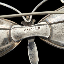 Load image into Gallery viewer, Close-up of a SILVER stamp on the back of a butterfly brooch
