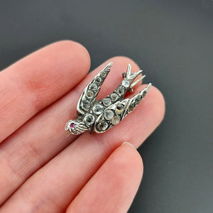 Antique Silver Paste Swallow Bird Brooch in hand