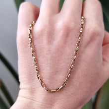 Load image into Gallery viewer, Antique 9ct Yellow Gold 17&quot; Fancy Double Link Chain in hand
