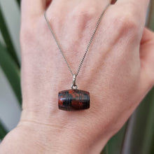 Load image into Gallery viewer, Antique Bloodstone Barrel Charm with Silver Chain in hand
