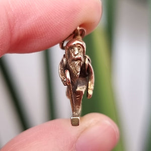 Victorian 15ct Gold Travelling Man Charm with Pearl in hand, front