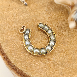 Antique 9ct Gold Pearl Horseshoe Charm/Pendant on wood