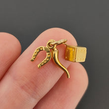 Load image into Gallery viewer, Italian 9ct Yellow Gold Lucky Triple Charm in hand
