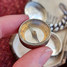 Load image into Gallery viewer, Victorian Sterling Silver Ship Compass Fob | Hallmarked Birmingham 1899 in hand
