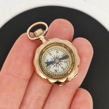 Load image into Gallery viewer, Antique Novelty Rolled Gold Pocket Watch Compass Pendant in hand
