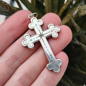 Victorian Sterling Silver Cross Pendant held in the hand