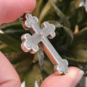 Victorian Sterling Silver Cross Pendant held in the hand