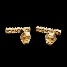 Load image into Gallery viewer, A pair of yellow gold three stone diamond bar set stud earrings, stamped DIA 020, on a black background
