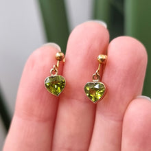 Load image into Gallery viewer, Vintage 9ct Gold Peridot Heart Screw Back Earrings in hand
