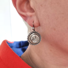 Load image into Gallery viewer, Victorian Silver Bird Drop Earrings modelled
