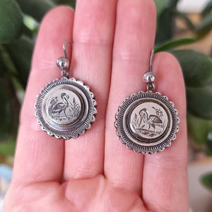 Victorian Silver Bird Drop Earrings in hand