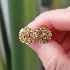 Victorian Gold Engraved Stud Earrings in hand