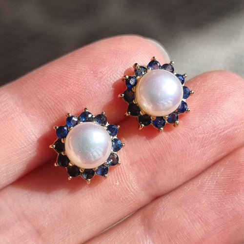 Vintage 9ct Gold Sapphire & Freshwater Pearl Cluster Stud Earrings in hand