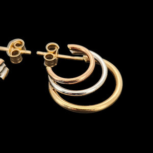 9ct Yellow, Rose and White Gold Triple Hoop Earrings side view, on a black background