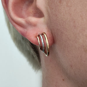 9ct Yellow, Rose and White Gold Triple Hoop Earrings modelled in the ear