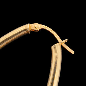 Italian 9ct Yellow Gold Oval Textured Hoop Earrings close-up of the Unoaerre stamp