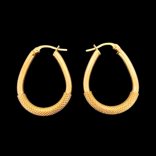Italian 9ct Yellow Gold Oval Textured Hoop Earrings on a black background