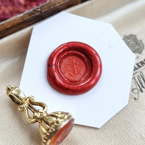 Antique Miniature Carnelian Anchor and Lyre Fob Seal wax impression