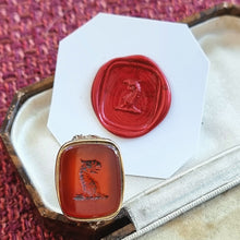Load image into Gallery viewer, Victorian Gilt Cased Carnelian Griffin Fob Seal with wax impression
