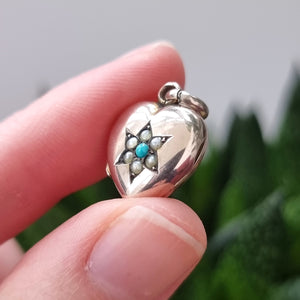 Antique 9ct Gold Turquoise and Seed Pearl Heart Locket in hand