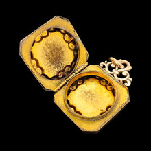 Load image into Gallery viewer, Antique Rolled Gold Ornate Locket Pendant open, showing the inside, on a black background
