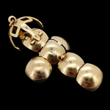 Load image into Gallery viewer, A folding masonic cross ball fob pendant in yellow gold and silver
