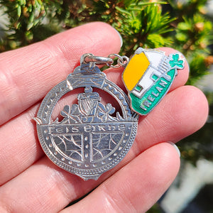 Vintage Sterling Silver Irish Fob Medal and Enamel Ireland Charm held in the hand