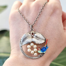 Load image into Gallery viewer, Vintage Sterling Silver Enamel Bird Necklace by Ward Brothers in hand
