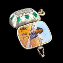 Load image into Gallery viewer, Decorative silver pendant with an enamelled Egyptian desert scene on a black background

