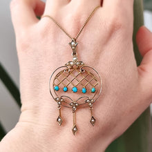 Load image into Gallery viewer, Antique 9ct Gold Turquoise and Seed Pearl Drop Pendant with chain in hand
